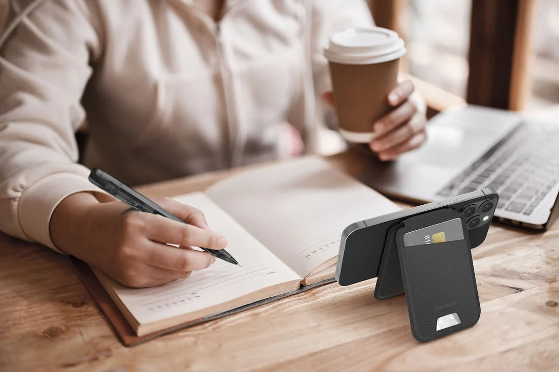 Black Momax 1-Wallet magnetic card holder with adjustable stand, compact wallet for credit cards and easy viewing.