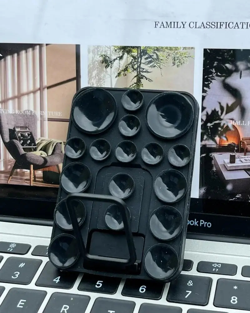 TecHub silicone suction mobile phone folding stand holder with adjustable grip, designed for hands-free viewing and easy stability.