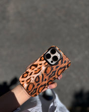 Brown leopard print TecHub phone case with trendy animal pattern and slim design for smartphones.