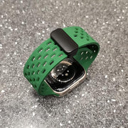 Soft silicone magnetic buckle breathable sport watch strap for Apple Watch 42mm to 49mm by TecHub, shown on a watch face.
