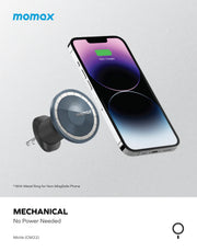 Momax MoVe Easy Magnetic Car Mount holder in black attached to a car dashboard, holding a smartphone securely.