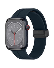 Magnetic silicone sport strap band for Apple Watch 42mm to 49mm, showcasing a black case with adjustable magnetic closure.
