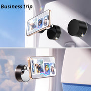 Black TecHub GOJI G10 magnetic phone holder with 360° rotation and strong magnetic grip for secure vehicle mounting.