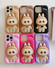 TecHub Labubu 3D cartoon silicone iPhone 16 case with hand stand, featuring colorful, playful character design.
