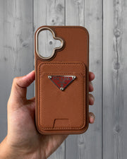 Brown Prada luxury leather case with MagSafe attachment for iPhone 16, featuring elegant craftsmanship and secure fit.