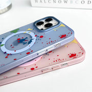 Pink Magsafe wireless charging case with graffiti polka dot design for iPhone 13 Pro Max, featuring colorful, artistic patterns.