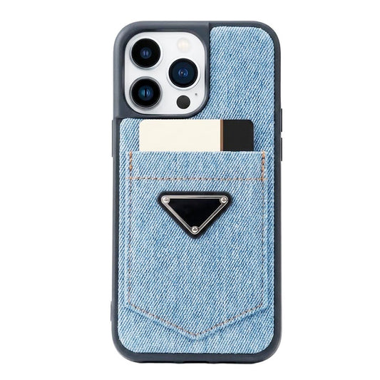 Blue Prada designer jeans style case for iPhone 14 Pro Max, featuring denim-inspired design and luxury branding.