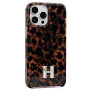 Glossy luxury TecHub iPhone 15 Pro Max case with sleek design and premium finish, showing the shiny surface and precise cutouts.