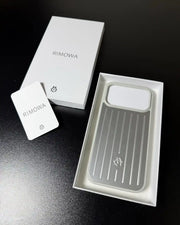 TecHub RIMOWA iPhone 17 Pro Max aluminium silicone case showing the sleek black finish and precise cutouts for buttons and camera.